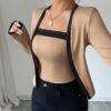 A Two-Piece Set for Women Featuring an Elegant And Stylish Color-Block Cardigan Paired with a Strapless Top