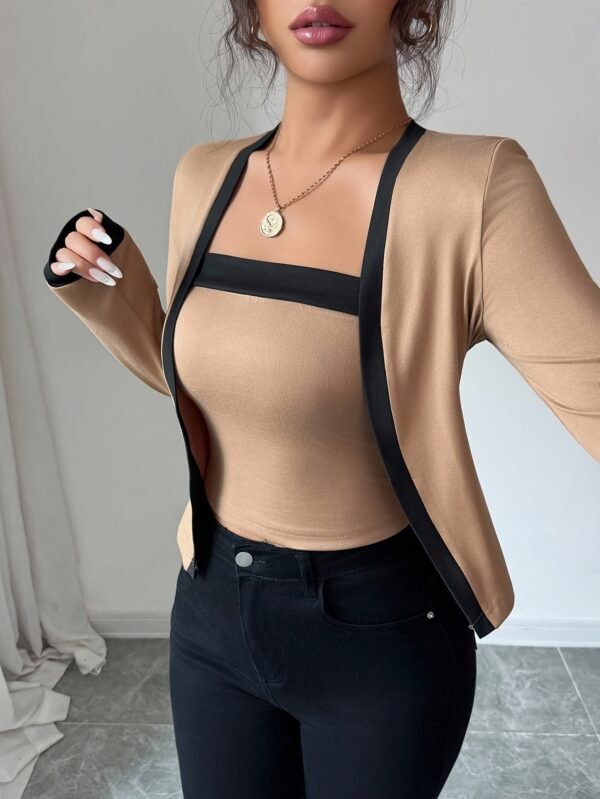 A Two-Piece Set for Women Featuring an Elegant And Stylish Color-Block Cardigan Paired with a Strapless Top